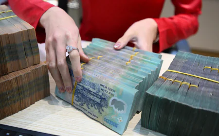 Vay ngân hàng để sửa nhà nhưng mua tiền ảo, có bị phạt?